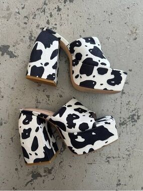 Cow-Print Platform Mule Heels in Black and White